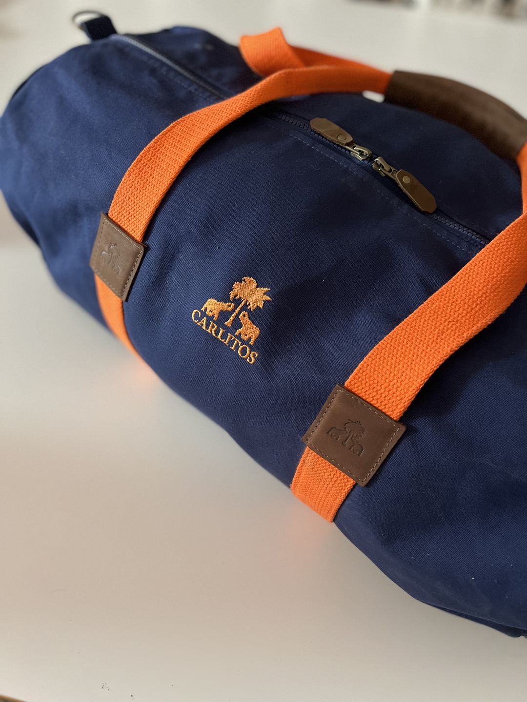 Customer photo review of Dufflebag NAVY -M- mit orangem Gurtband