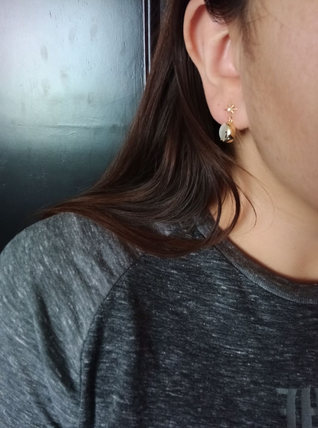 Customer photo review of Aretes de Saturno de Ópalo