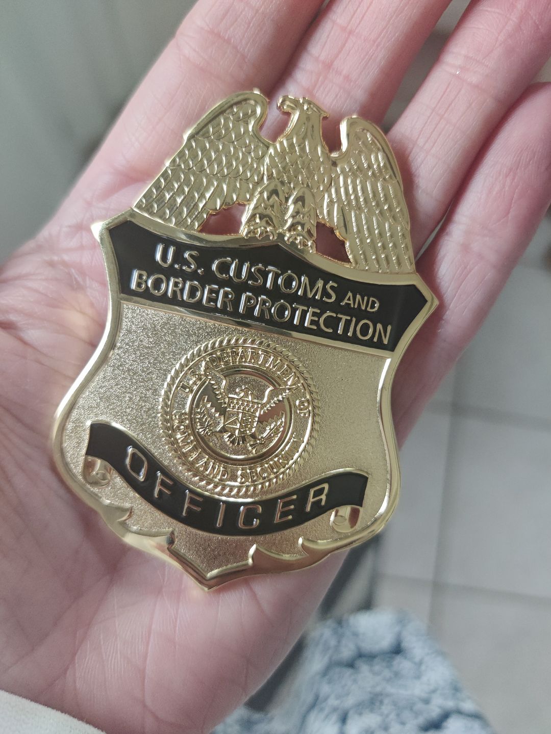 Customer photo review of US CBP Officer Customs and Border Protection Badge Solid Copper Replica Movie Props