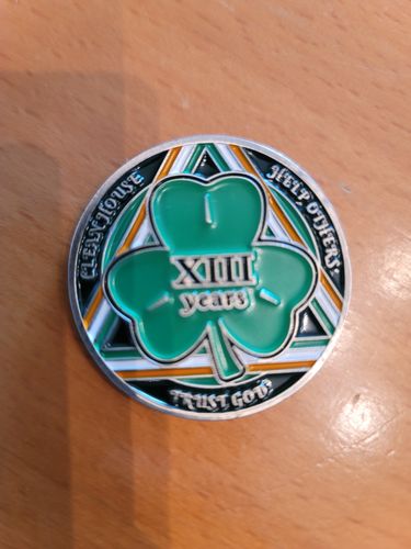 Customer photo review of 13 Year Shamrock Themed AA/NA Recovery Medallion - 40mm Fancy Chip/Coin - Green/White/Orange