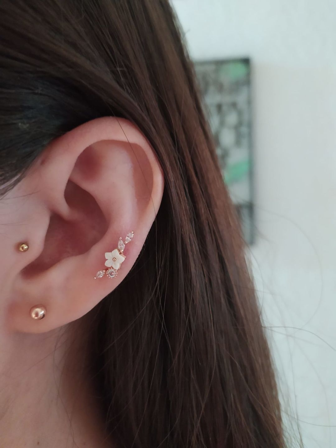 Customer photo review of Piercing de Florecita con Zirconias
