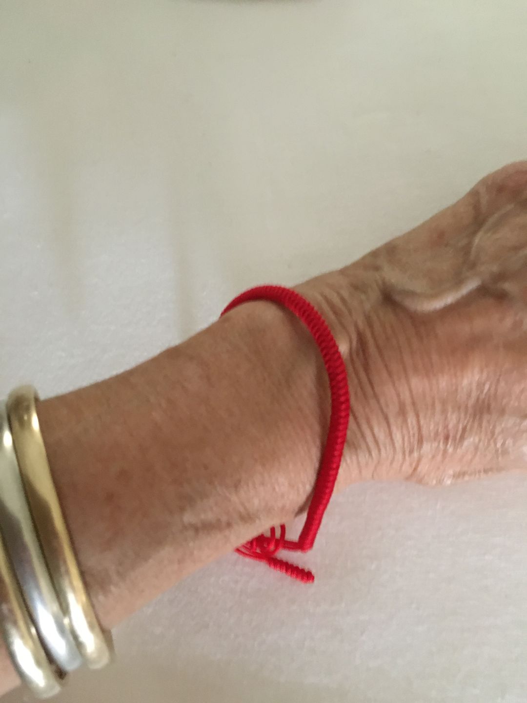 Customer photo review of Tibetan Buddhist Handmade Lucky Knots Bracelet