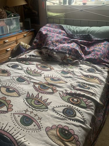 Customer photo review of Eyes On You Throw Blanket