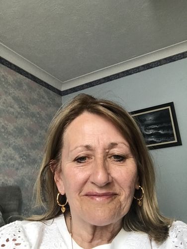 Customer photo review of Amore Heart Hoop Earrings