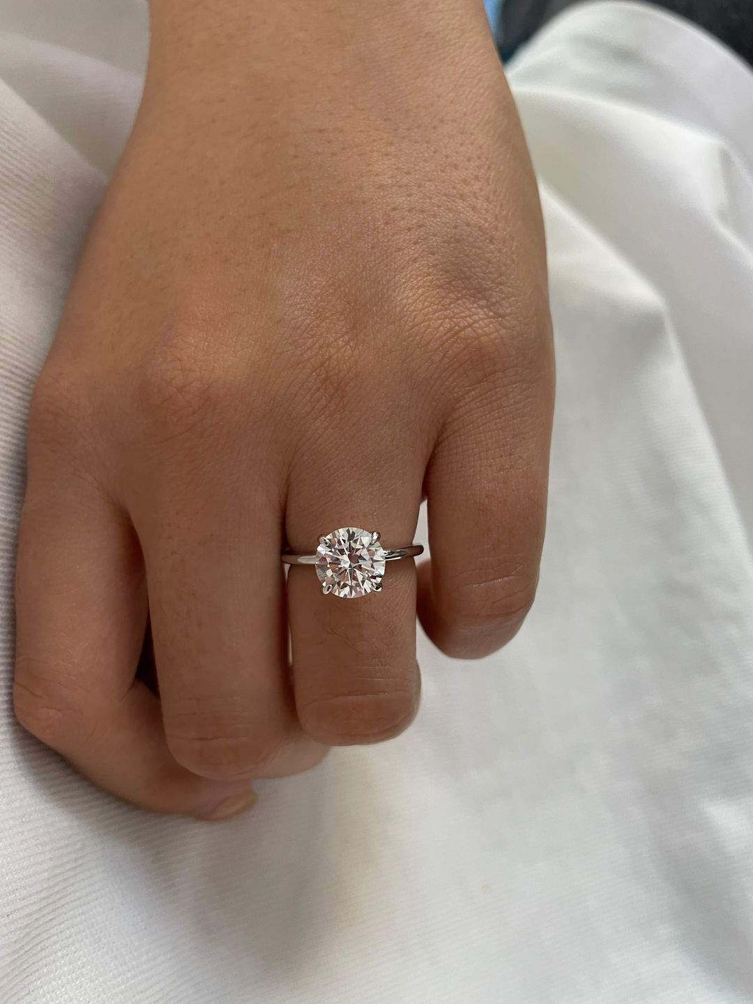 Customer photo review of Louily Classic Round Cut Engagement Ring For Women In Sterling Silver