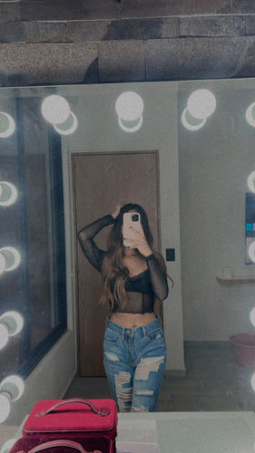 Customer photo review of Hem lace ruffled long sleeve mesh crop top - Final Sale