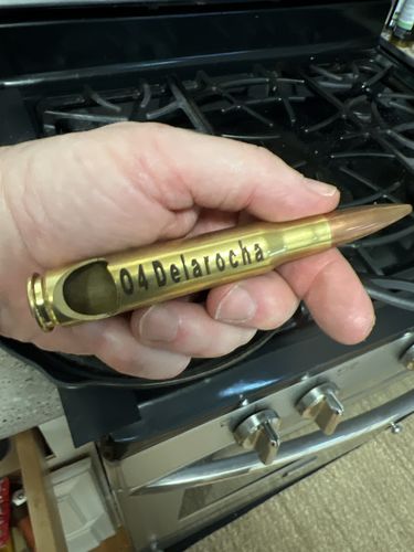 Customer photo review of Personalized 50 Caliber BMG Bullet Bottle Opener