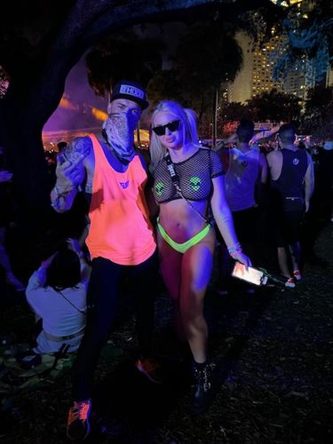 Customer photo review of Size Up Neon Orange Y Back