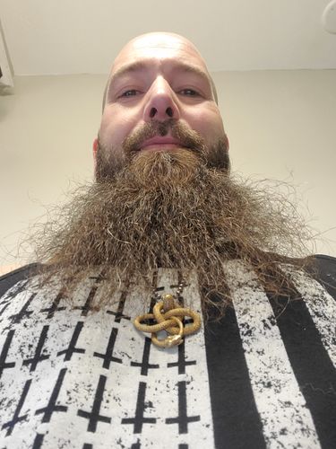Customer photo review of Ouroboros Pendant | Brass
