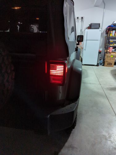 Customer photo review of Textured Black US Flag Tail Light Guards for 07-18 Jeep Wrangler JK/ JKU