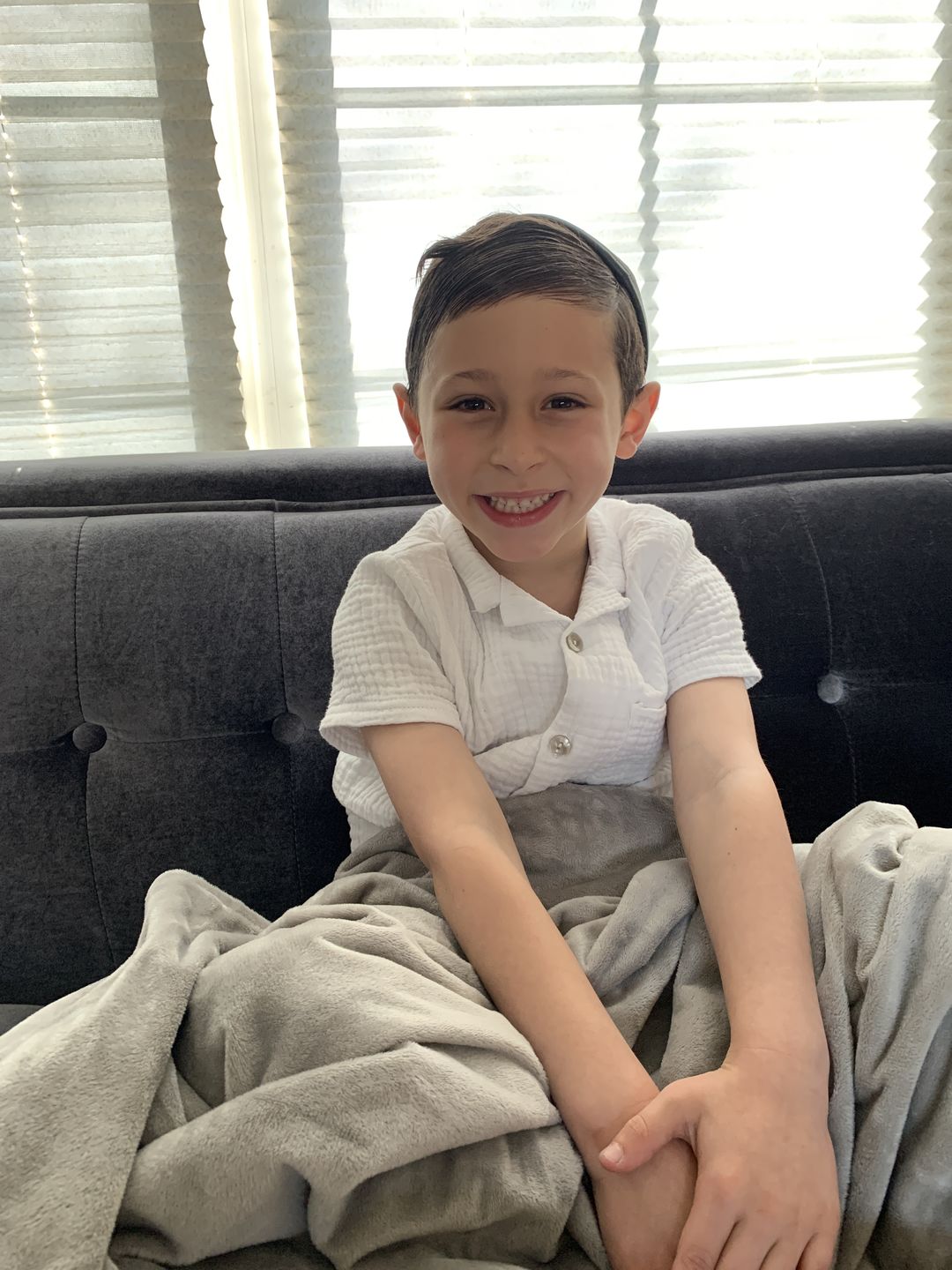Customer photo review of BiggerBee Minky Throw Blanket Solid Light Grey