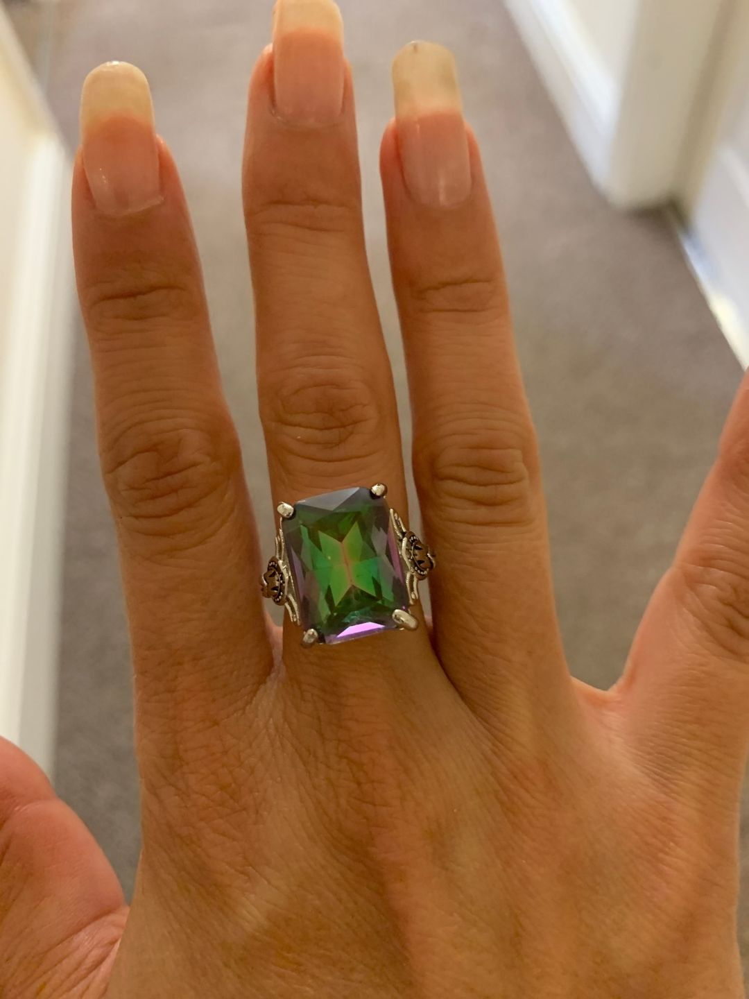Customer photo review of Enormous Rainbow Mystic Topaz Ring