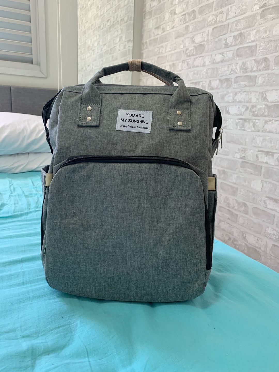 Customer photo review of Sac à langer lit nomade - Passion Bébé