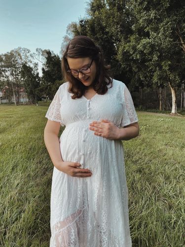 Customer photo review of The Wanderer White Lace Maternity Gown