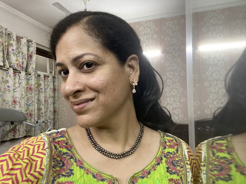 Customer photo review of Forever Zircon Peacock Rose Plated Earrings