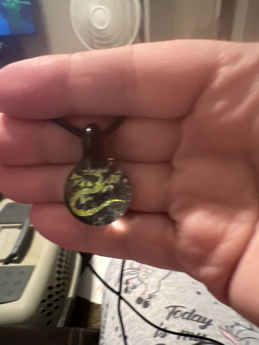 Customer photo review of Dragon Hologram Pendant with Infused Cremation Ash
