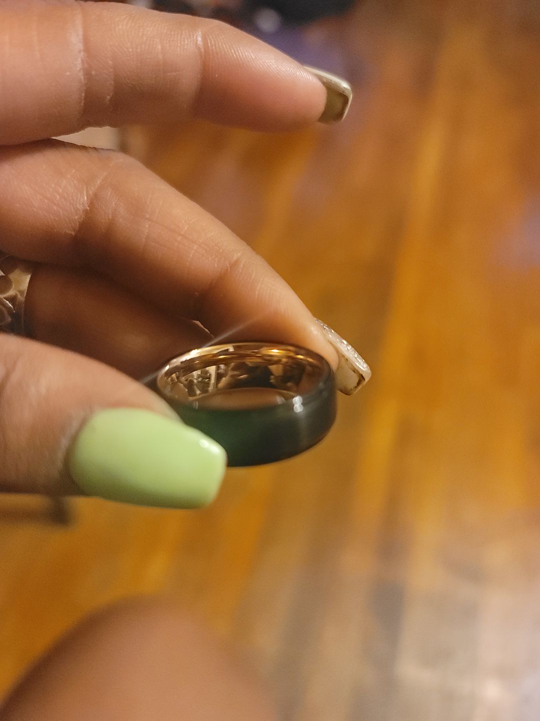 Customer photo review of 8mm Black and Rose Gold Tungsten Carbide Wedding Ring