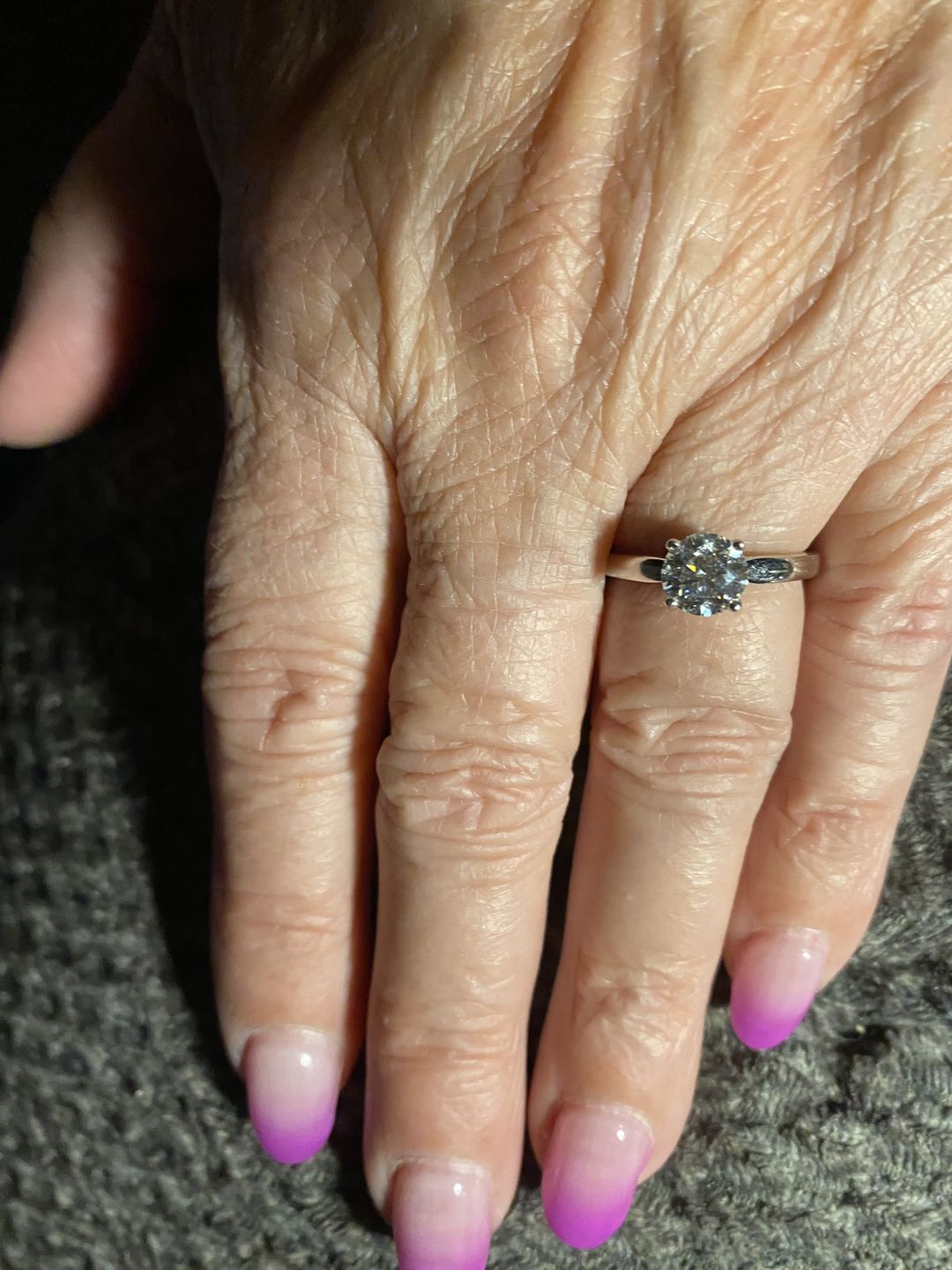 Customer photo review of Classic Solitaire Round Moissanite Four Prong Engagement Ring