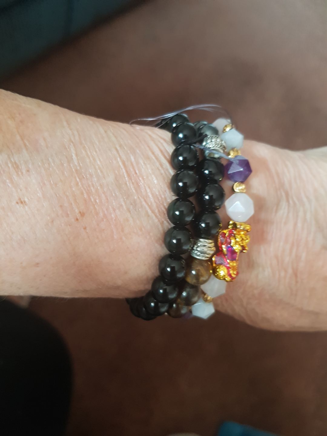 Customer photo review of Wealth Pixiu Charm in Natural Amethyst Bracelet