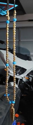 Customer photo review of Brass Rattlesnake Tail Pendant