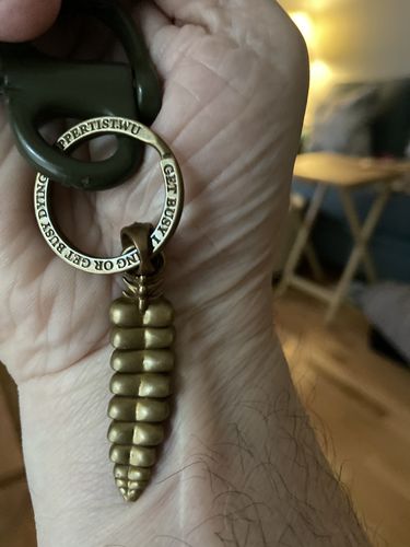 Customer photo review of Brass Rattlesnake Tail Pendant