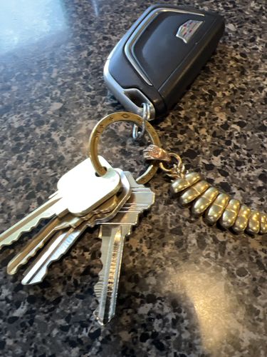 Customer photo review of Brass Rattlesnake Tail Pendant