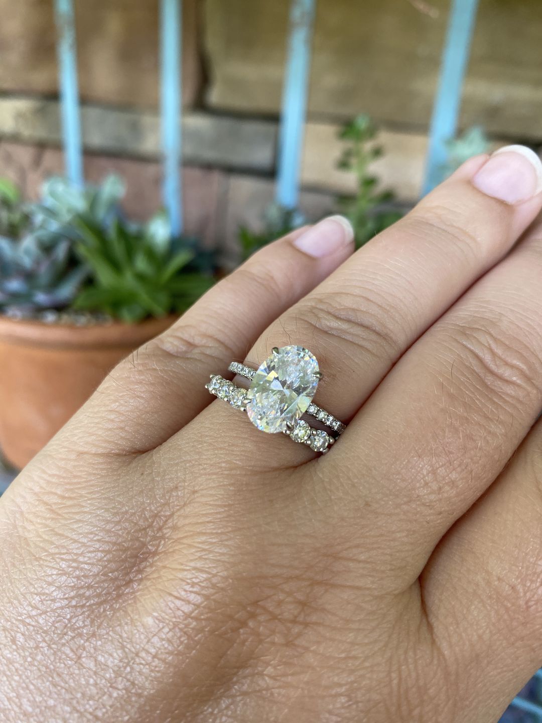 Customer photo review of Round Moissanite Sterling Silver Wedding Band Stackable Ring