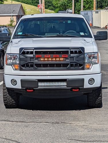 Customer photo review of Armor Grille w/Amber Lights, Replaceable Letters- Matte Black for 2009-2014 Ford F150