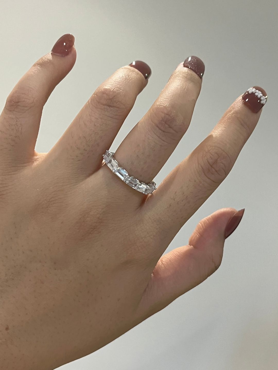 Customer photo review of Louily Exquisite Emerald Cut Women's Wedding Band In Sterling Silver