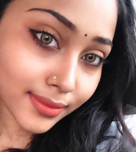Customer photo review of Cocktail Tequila sunrise Colored Contact Lenses