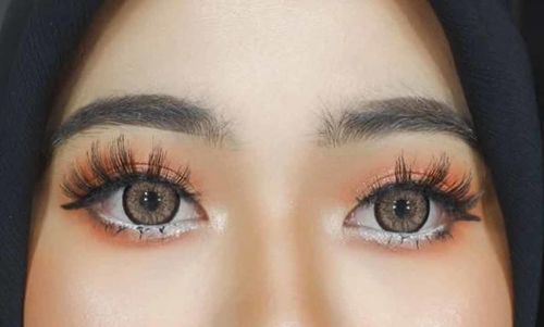 Customer photo review of Cocktail Tequila sunrise Colored Contact Lenses