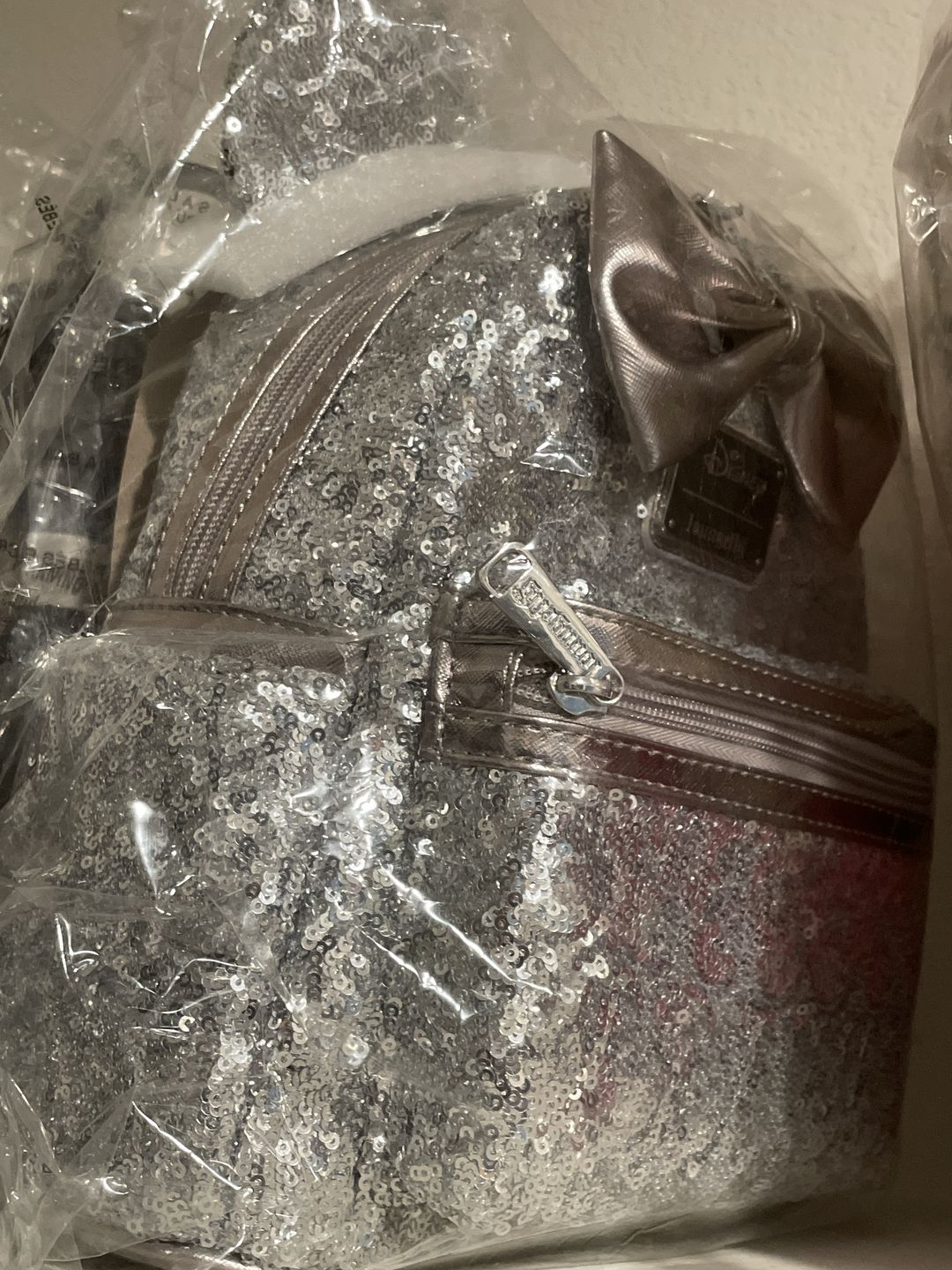 Customer photo review of 707 Street Exclusive - Disney Minnie Mouse Silver Sequin Mini Backpack - June Preorder