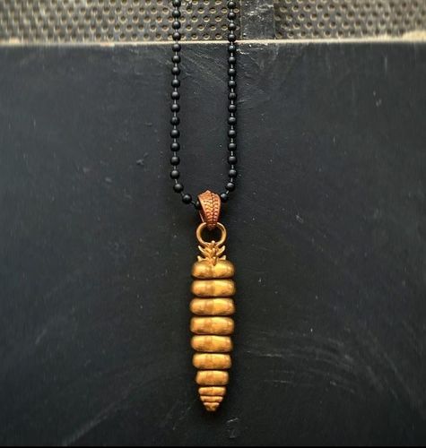 Customer photo review of Brass Rattlesnake Tail Pendant