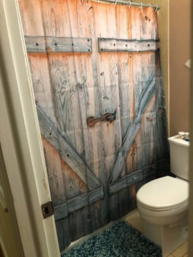 Customer photo review of Barn Doors Fabric Shower Curtain