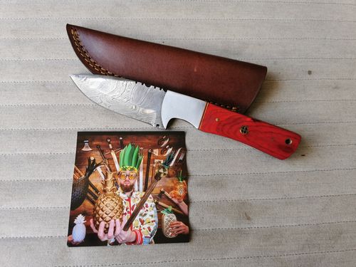 Customer photo review of Padauk Damascus Hunting Knife