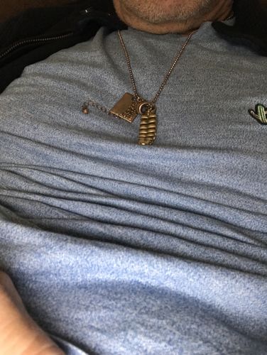 Customer photo review of Brass Rattlesnake Tail Pendant
