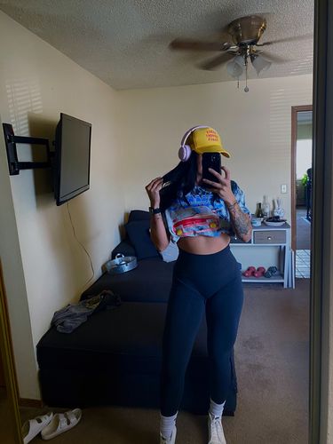 Customer photo review of Babes Support Babes Mustard Trucker Hat