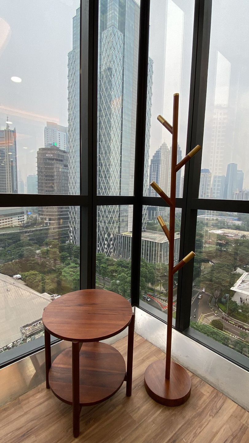 Customer photo review of Minimalist Teak Coat Rack – Branch Design