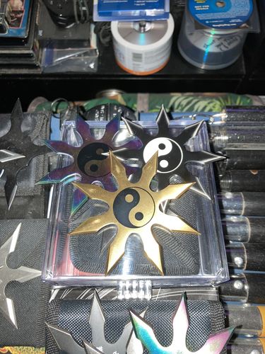 Customer photo review of 8 Point Black Silver Ying Yang Shuriken Throwing Ninja Star