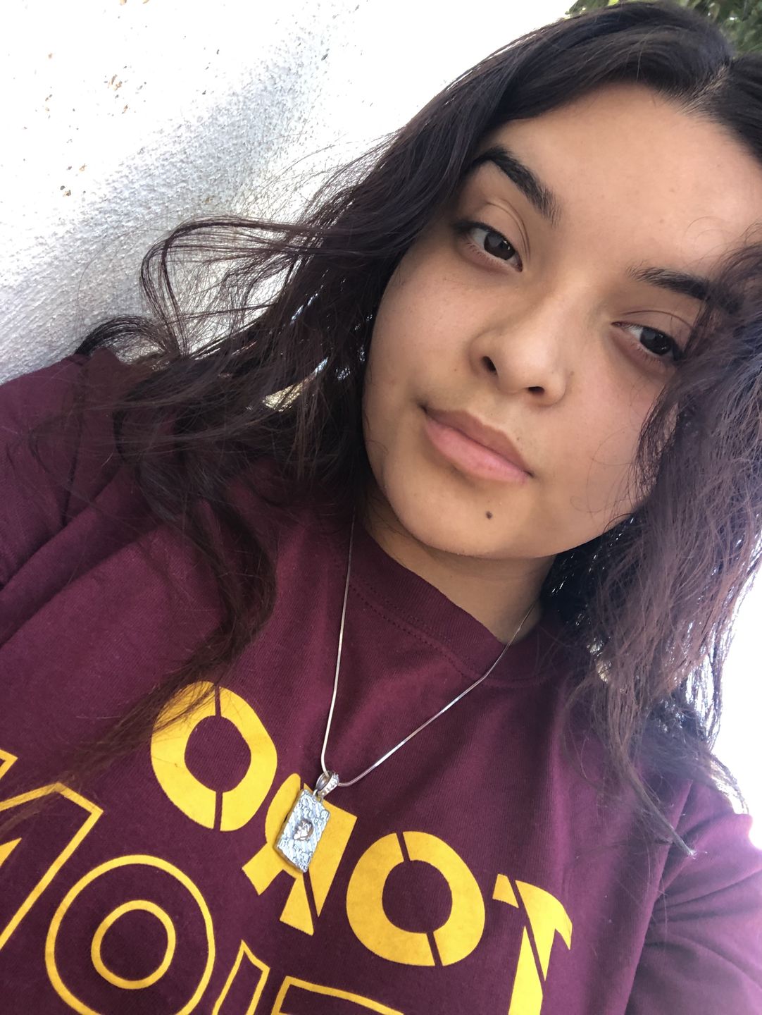 Customer photo review of LAUGH NOW, DIE LATER PENDANT