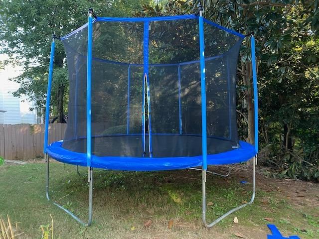 Customer photo review of Classic Outdoor Trampoline with Basketball Hoop