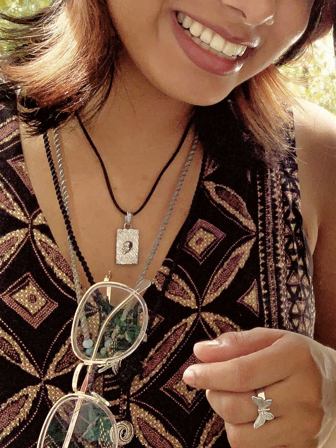Customer photo review of LAUGH NOW, DIE LATER PENDANT