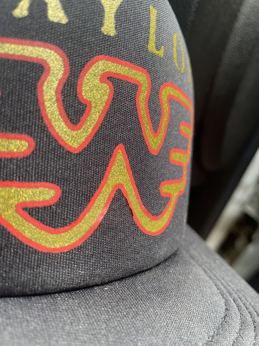 Customer photo review of Waylon Jennings Distressed Flying W Trucker Hat - Black