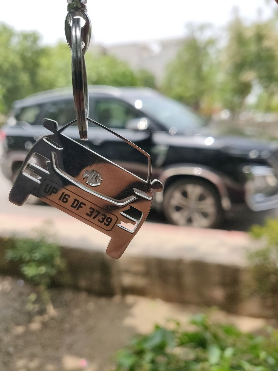 Customer photo review of Personalised Number Plate Car Keychain
