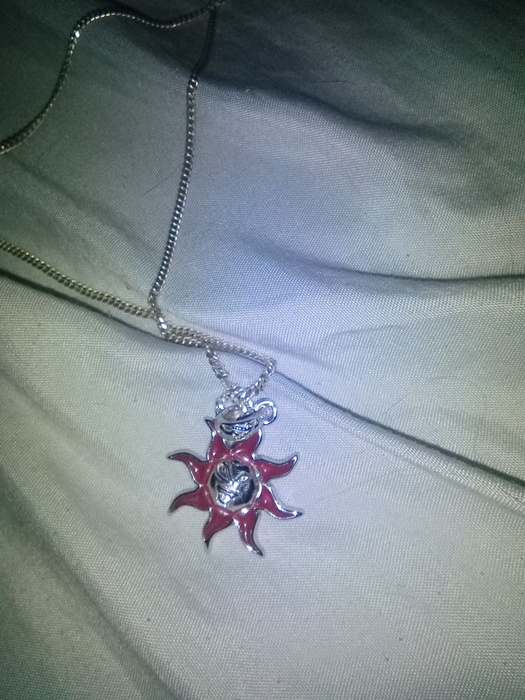Customer photo review of SUNNY THE SOMBER SUN PENDANT