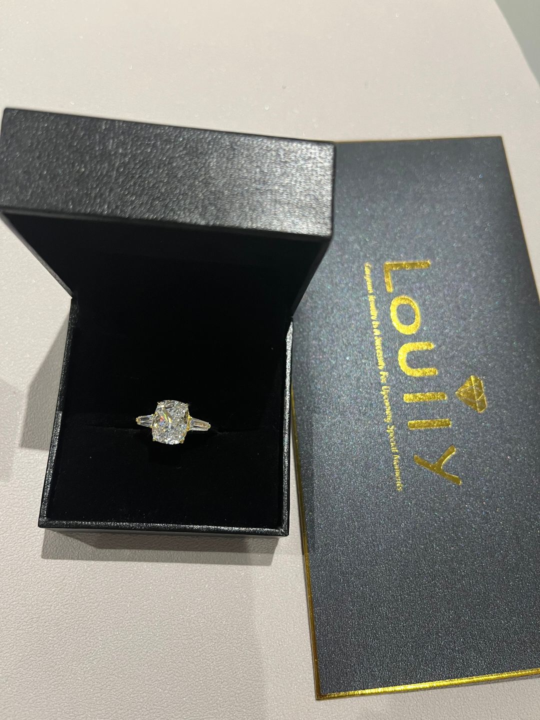 Customer photo review of Louily Exquisite White Gold Cushion Cut Three Stone Engagement Ring In Sterling Silver