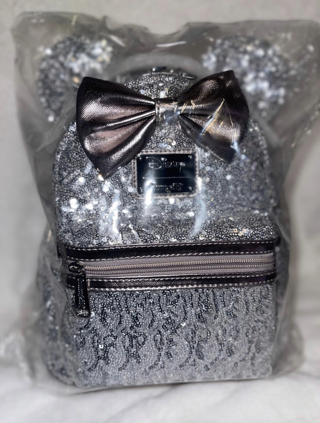 Customer photo review of 707 Street Exclusive - Loungefly Disney Minnie Mouse Silver Sequin Mini Backpack