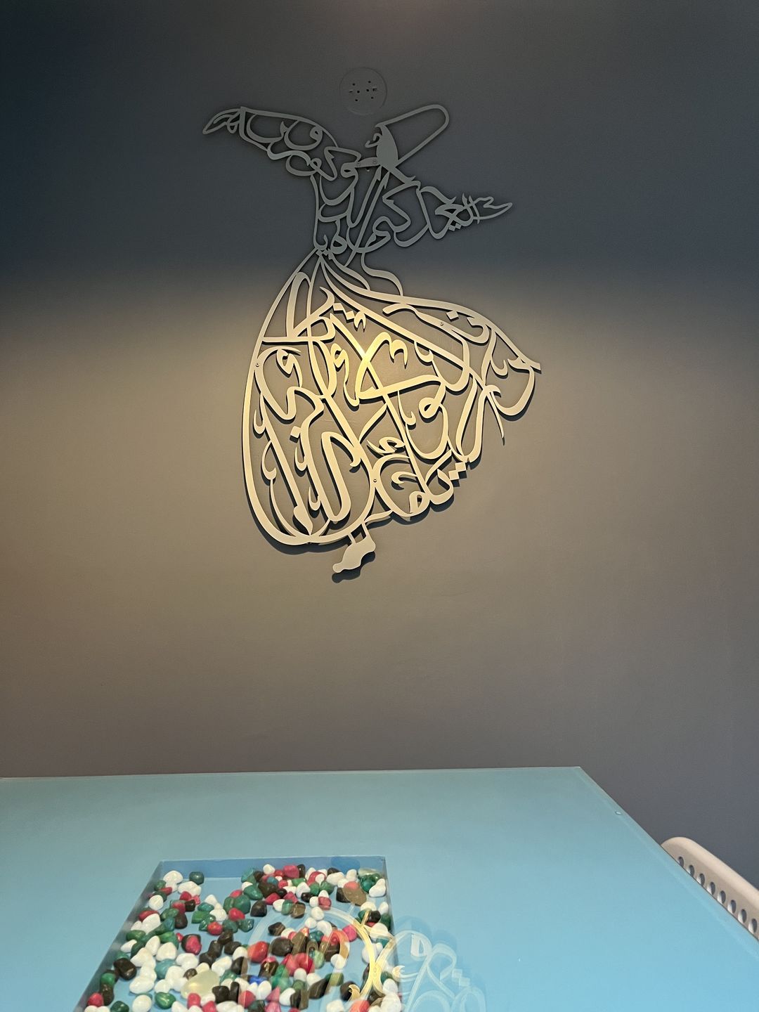 Customer photo review of Whirling Dervish Metal Islamic Wall Art