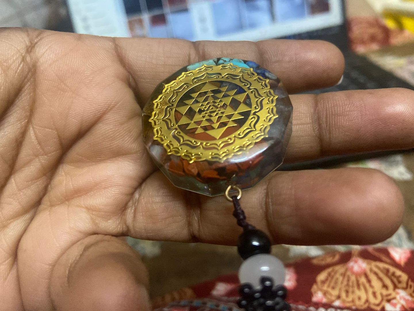 Customer photo review of Sacred Sri Yantra Orgonite Chakra Necklace