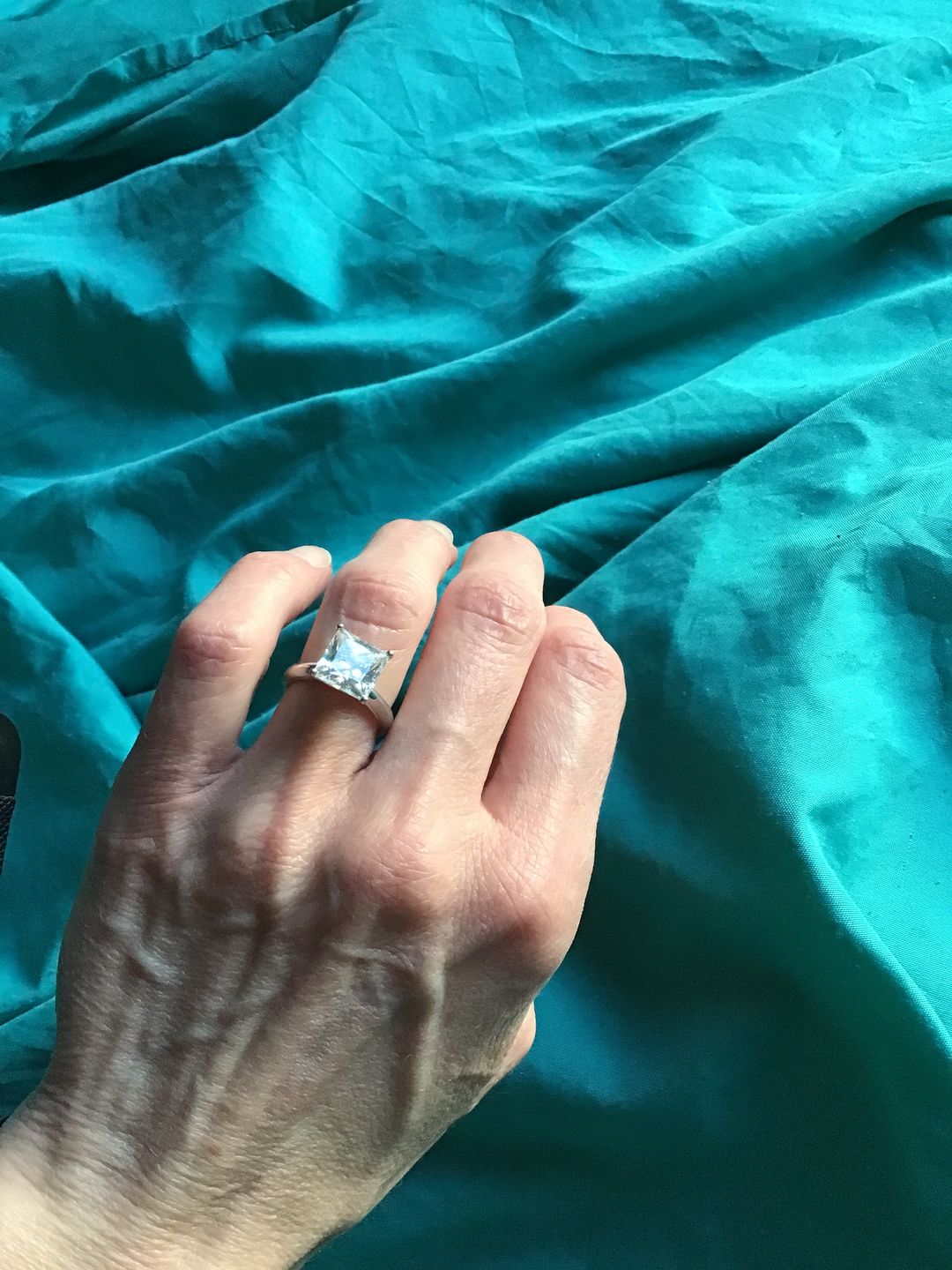 Customer photo review of Classic Solitaire Princess Cut sona diamond sterling silver ring